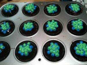 Cupcakes with decorations resembling cells